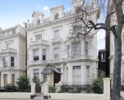 Kensington & Chelsea property market report Q4- exterior of stucco house in Holland Park